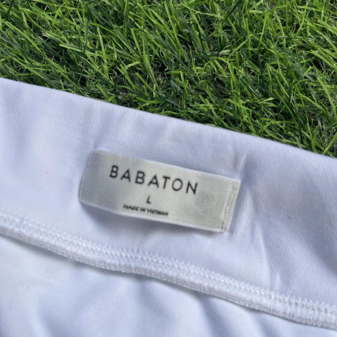 Babaton White Skirt Size L (Category: Skirts) located in Cuyapo. Submitted by Ashtyn.Pre.Loved (Listing ID 1469062831, Image 2). Description: - Brand: Babaton - Color: Solid White - Size: L (Waist: 30-32 inches) - Length: 17 inches - Condition: Brand new with original store tag attached - Style: Basic, versatile everyday wear with a flat waistband.
