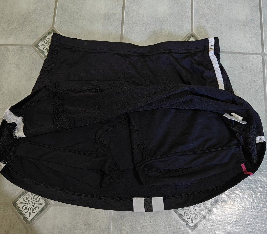Babolat (Category: Skirts) located in Mandaue City. Submitted by prekfinds (Listing ID 1468990897, Image 3). Description: Babolat Tennis skort Athletic skirt with built-in shorts in black with white side striping and the Babolat brand logo near the hem. As new condition Size: Medium on tag Dimes: 26-28W x 12L No issue.