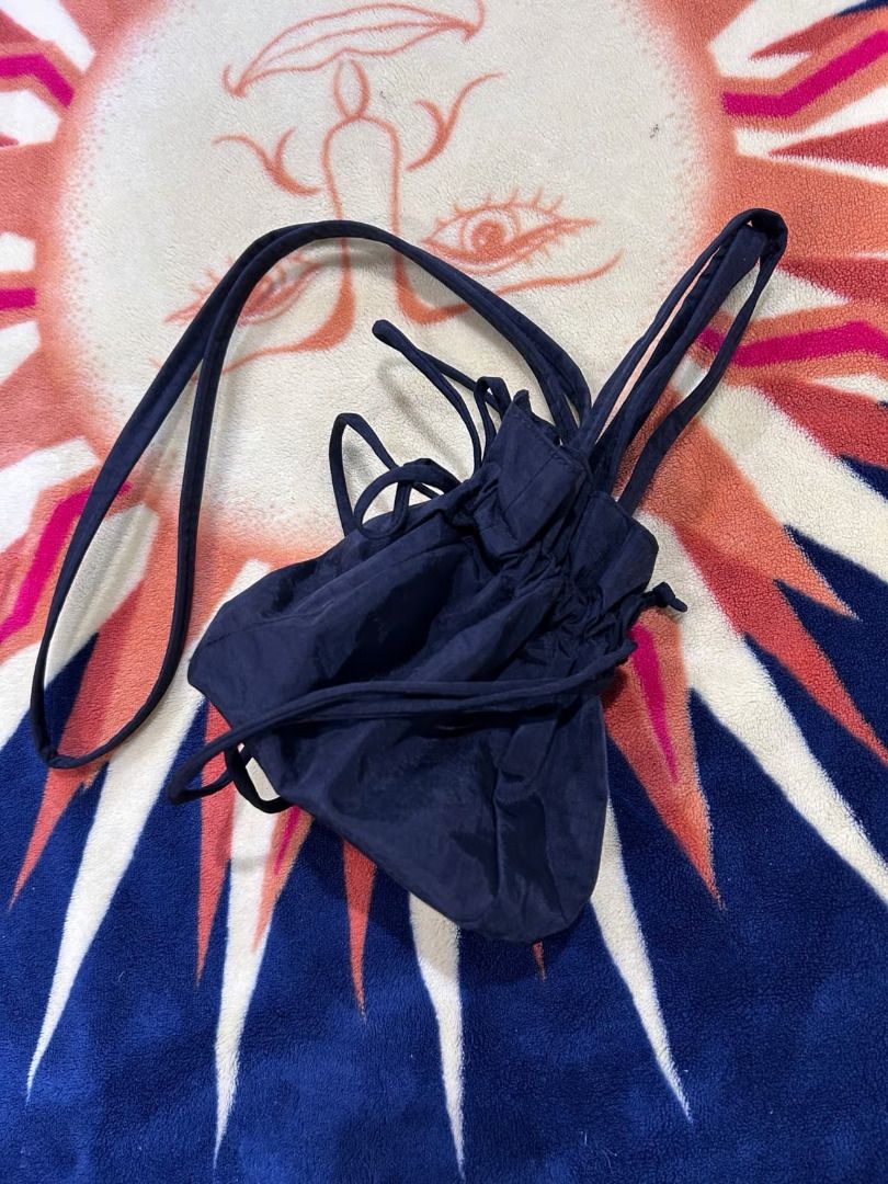 [free sf] BAGGU Nylon Drawstring Bag - Black (Category: Cross-body Bags) located in Mabalacat. Submitted by keb-a (Listing ID 1469062686, Image 2). Description: 🍒 — Measures 8.6" H x 5.5" W x 5.5" L — 39” strap & two 17.7” (7.5” drop length) top handles — Interior zip pocket — Recycled heavyweight nylon, recycled ripstop nylon lining — Machine washable — Can be worn as a crossbody bag or top-handle bag 🍒 — Authentic, purchased from Certified Ca