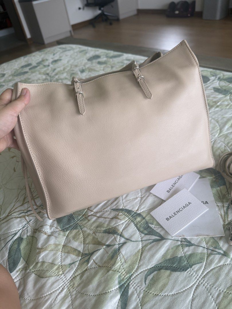 Balenciaga in Neutral Beige (Category: Luxury Bags & Wallets) located in Calamba. Submitted by mom2girls (Listing ID 1468931343, Image 2). Description: A very classy and decent bag. Can go with any outfit. Please note the minor scratch at the bottom of the bag and the ink stain inside the bag as shown in the photos. Threw away that pen since then. Shipping via LBC Nuvali only. SF c/o Buyer. .