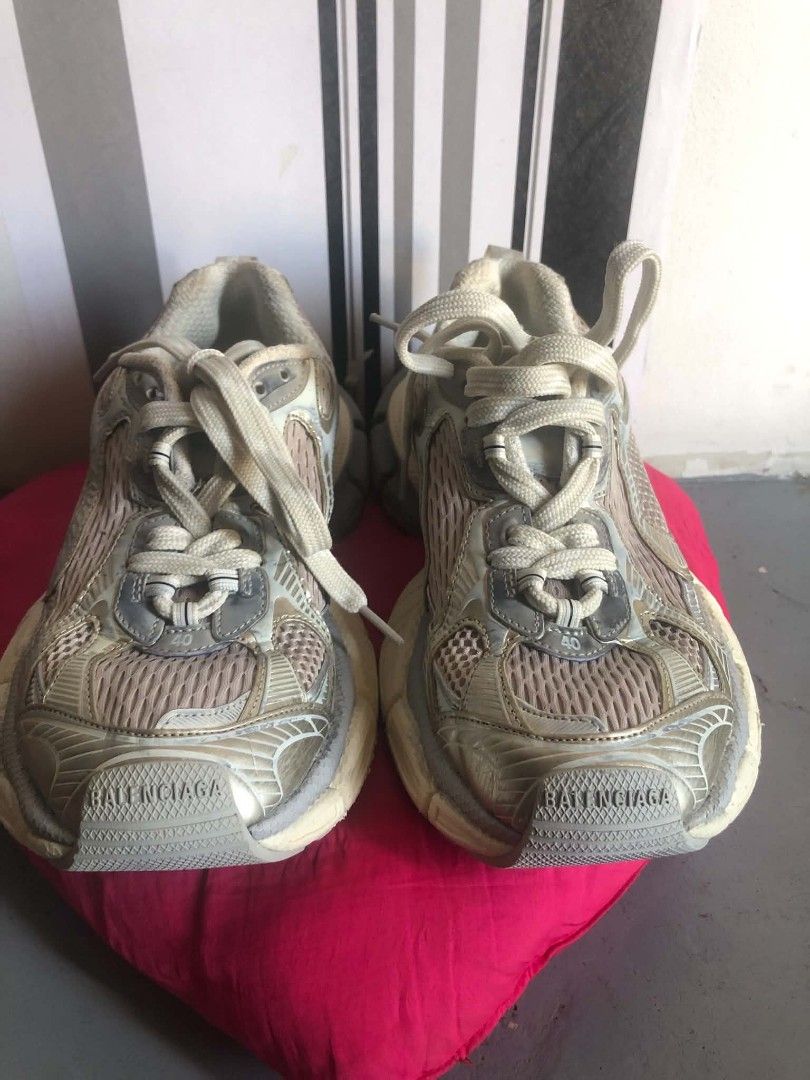 Balenciaga Runner Sneakers Metallic Silver Size 40 (Category: Sneakers) located in Manila. Submitted by wonderboi80 (Listing ID 1468982891, Image 3). Description: - Brand: Balenciaga - Model: Runner Sneakers - Colorway: Silver and Off-White - Size: 40 (marked on toe and tongue) - Design: Chunky layered sole with mesh and metallic panels, Balenciaga logo on front bumper - Closure: Lace-up with thick round laces - Condition: Pre-owned with visible 