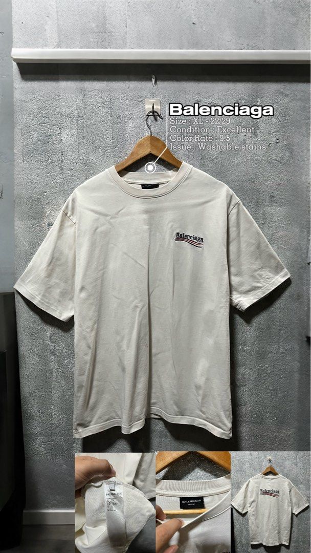 Balenciaga Wave Logo Tee White XL (Category: Tshirts & Polo Shirts ) located in Lubao. Submitted by genjithrifted (Listing ID 1469033406, Image 1). Description: - Brand: Balenciaga - Color: White - Size: XL (Oversized fit) - Measurements: 22" across x 29" down - Design: Small embroidered wave logo on the chest - Condition: Has minor washable stains, needs a quick wash; neck and wash tags are fully intact - Style: Perfect, comfortable everyday pie