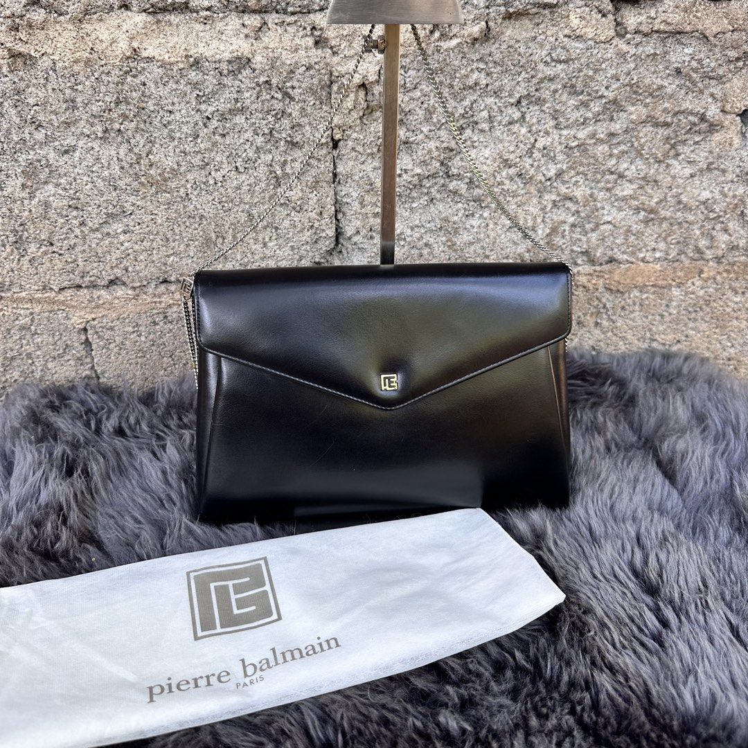 BALMAIN Smooth calfskin PB Logo Shoulderbag (Category: Shoulder Bags) located in Cagayan de Oro. Submitted by kjcartier26 (Listing ID 1468997329, Image 1). Description: Authentic, Silver strap, Good corners. - With dustbag, Powdery inside - Smooth calfskin Material.