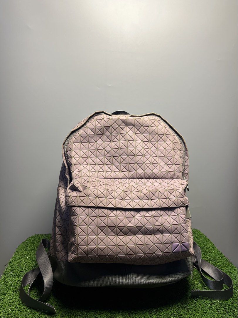 BAO BAO ISSEY MIYAKE - REFLECTOR DAYPACK BACKPACK (Category: Luxury Bags & Wallets) located in Bacolod City. Submitted by timelessbyjosh (Listing ID 1469113028, Image 3). Description: BEST FOR CASUAL & AVANT GARDE OUTFITS SIZE : ACTUAL COLOR : LIGHT PINK & LILAC COLOR RATE : 9. 5 OF 10 CONDITION : EXCELLENT MATERIAL : ( OUTER/BODY MATERIAL ) : POLYVINYL CHLORIDE ( BASE FABRIC/PART ) : POLYESTER ( LINING/STRAPS ) : NYLON ( HARDWARE/OTHER ) - BRASS