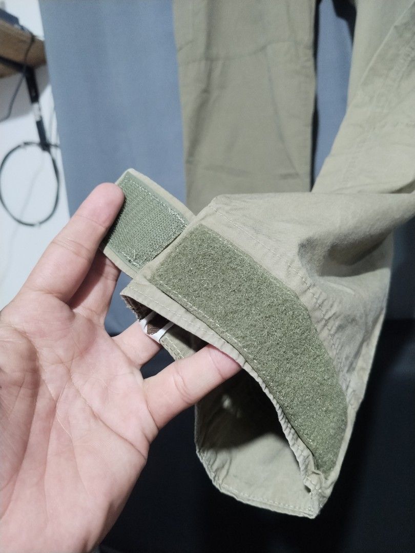 Bape Maritime Squadron Military Cargo Pants (Category: Jeans) located in Pasig City. Submitted by loveforlux_2025 (Listing ID 1468940588, Image 3). Description: - Authentic BAPE cargo pants in a stylish olive green color - Relaxed fit utility style for maximum comfort - Multiple practical utility pockets and reinforced knee panels - Adjustable velcro cuffs at the ankles for a customizable fit - Branded buttons and signature ape head tag near the 