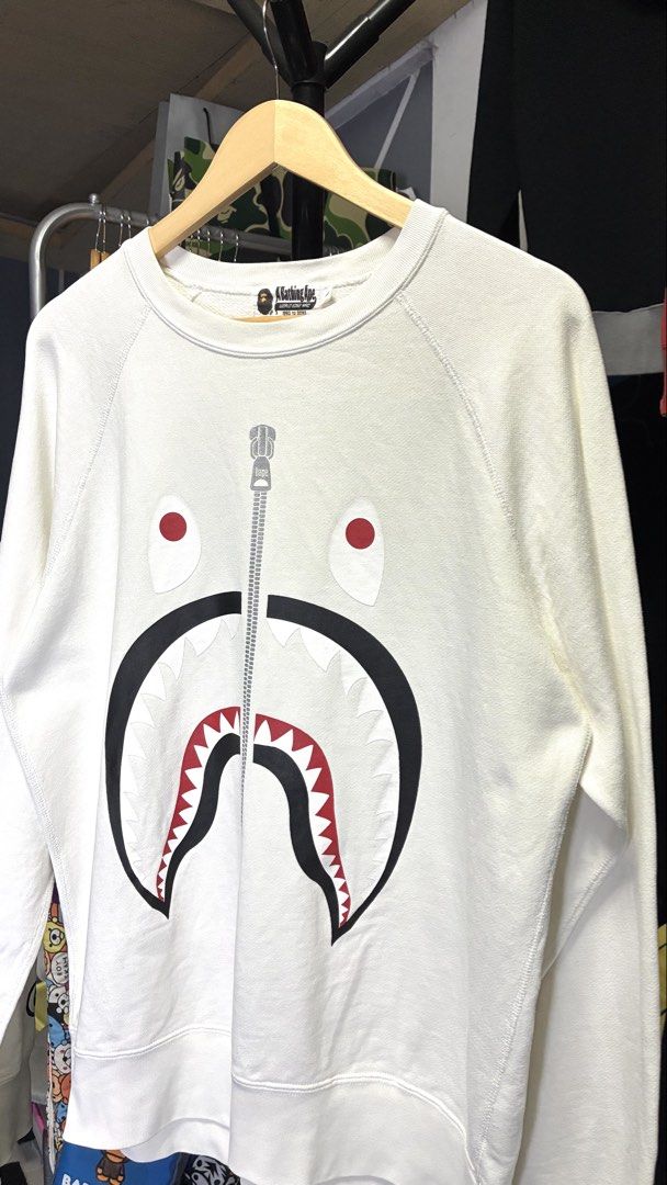 Bape Shark Long Sleeve (Category: Coats, Jackets and Outerwear) located in Palayan City. Submitted by room_of_thrift (Listing ID 1469137630, Image 3). Description: Bape Shark Long Sleeve with WGM Carpet Letter on Back W - 22.5 L - 28 Asnew Condition Color Rate 9.7/10.