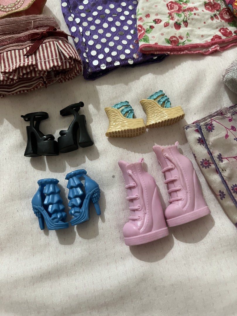 Barbie Clothes Bundle Model Muse (Category: Kids Toys) located in Manila. Submitted by lovedbyjk (Listing ID 1469100673, Image 3). Description: Sold as Bundle Only- Discounted Price Already, Bought them individually totaling 3.5k but selling low RFS: Minimizing my model muse clothes due to changing my doll collection line. Focusing in Repros -Top Model Teresa (Top, Pants, Socks) -Red Mini snap button skirt -Y2K tops -Fashion fever shoes -Bundles 