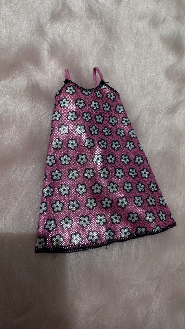 Barbie pink metallic dress (Category: Kids Toys) located in Mandaluyong City. Submitted by maelovestoshop (Listing ID 1469132277, Image 1). Description: No flaws.