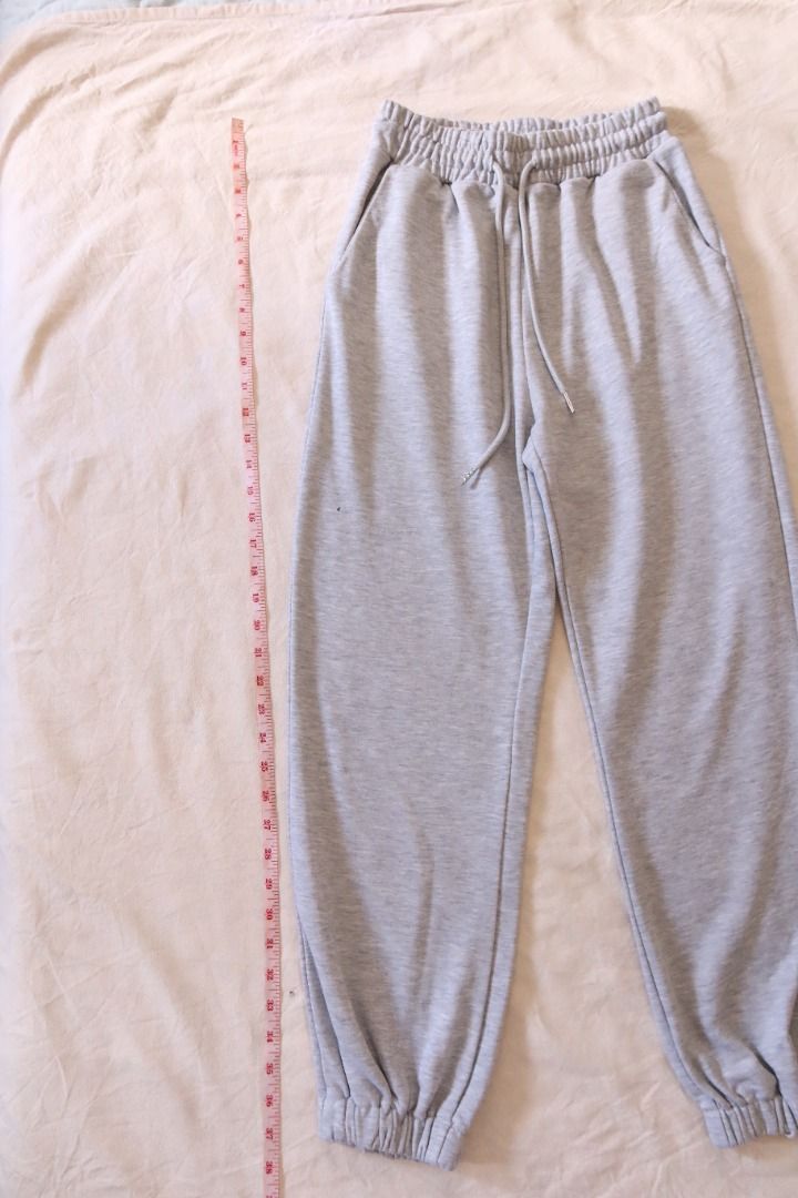 Basics Grey Drawstring Sweatpants Joggers (Category: Joggers) located in Manila. Submitted by imama23 (Listing ID 1468951162, Image 3). Description: Brand: Zalora Basics - Color: Grey - Elasticated waistband with adjustable drawstring Condition: 7/10, has small stain as seen in photo 4 Measurements: - Waist: 11in (stretchable up to 14in) - Length: 37in Location: Manila (near taft) Shipping - Payment first before shipping - J&T, Grab, or Lalamove 