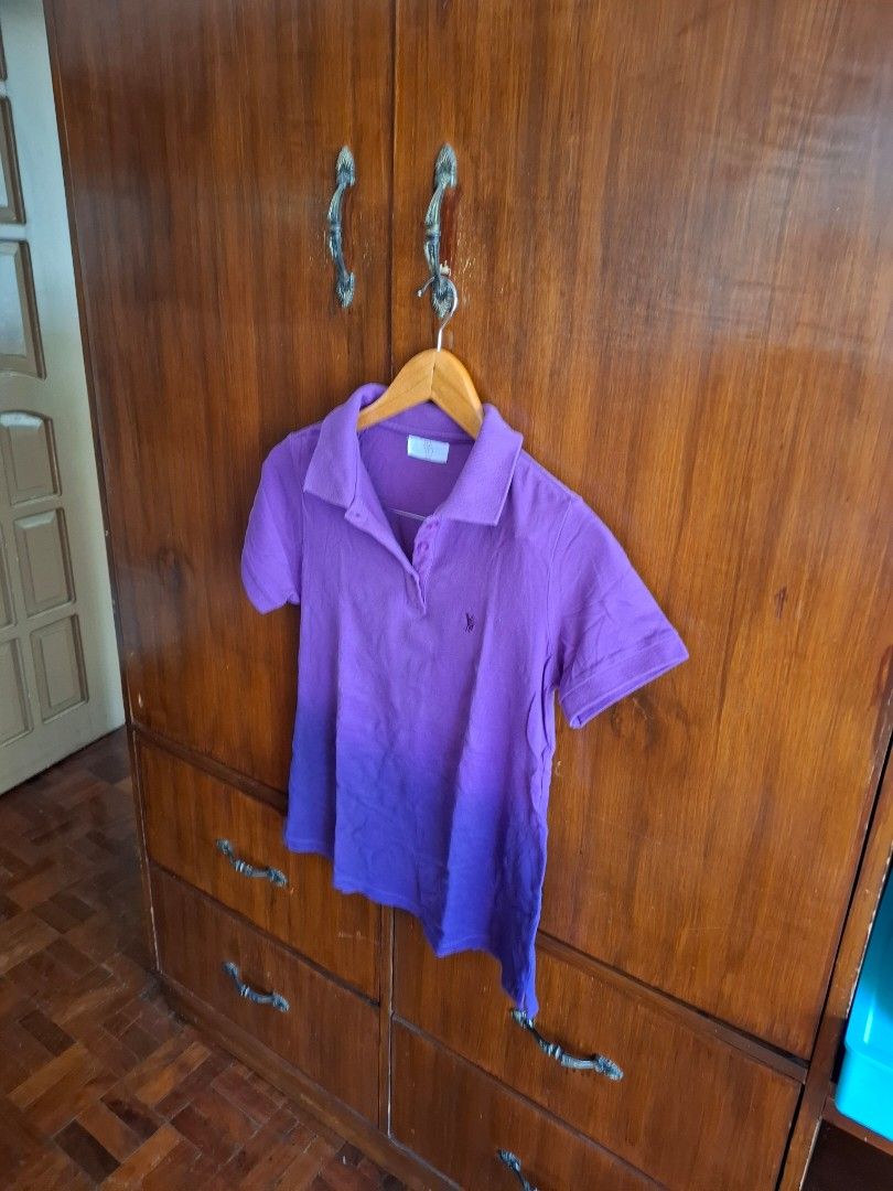 Bayo Purple Polo Shirt Medium (Category: Shirts) located in Manila. Submitted by valimento.jr025 (Listing ID 1469156322, Image 1). Description: - Brand: Bayo - Color: Vibrant purple - Size: Medium - Details: Short sleeves, classic collar, button placket, small embroidered chest logo - Styling: Easy to match with jeans or shorts.
