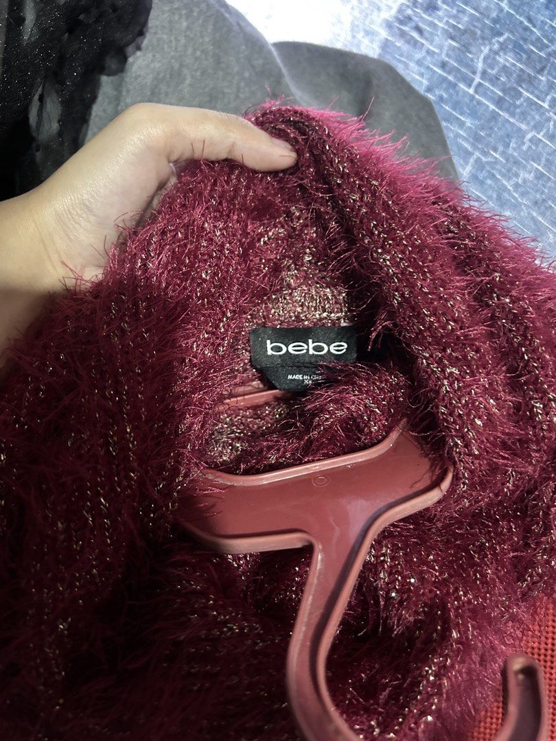Bebe top turtle neck (Category: Others Tops) located in Dasmarinas. Submitted by fitsbewit.u (Listing ID 1469006989, Image 2). Description: xs on tag Loc: Dasmariñas cavite Mop: gcash Mod: j&t .