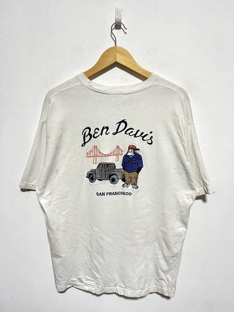 BEN DAVIS GOLDEN GATE BRIDGE LOGO TEE (Category: Tshirts & Polo Shirts ) located in Compostela. Submitted by kimoykimoy (Listing ID 1468935511, Image 2). Description: Medium on tag fit to Large Dimension: 21.5x29 Color rate & Condition: 9.8/10 Actual Color: Off White Issue: Dirt stain, Need wash *Cotton Fabrics, Embroidered logo Authentic/Legit Location: Compostela, Davao de Oro, Mindanao Disclaimer: Not affiliated with any of the brands or compa