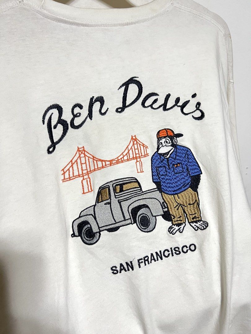 BEN DAVIS GOLDEN GATE BRIDGE LOGO TEE (Category: Tshirts & Polo Shirts ) located in Compostela. Submitted by kimoykimoy (Listing ID 1468935511, Image 3). Description: Medium on tag fit to Large Dimension: 21.5x29 Color rate & Condition: 9.8/10 Actual Color: Off White Issue: Dirt stain, Need wash *Cotton Fabrics, Embroidered logo Authentic/Legit Location: Compostela, Davao de Oro, Mindanao Disclaimer: Not affiliated with any of the brands or compa