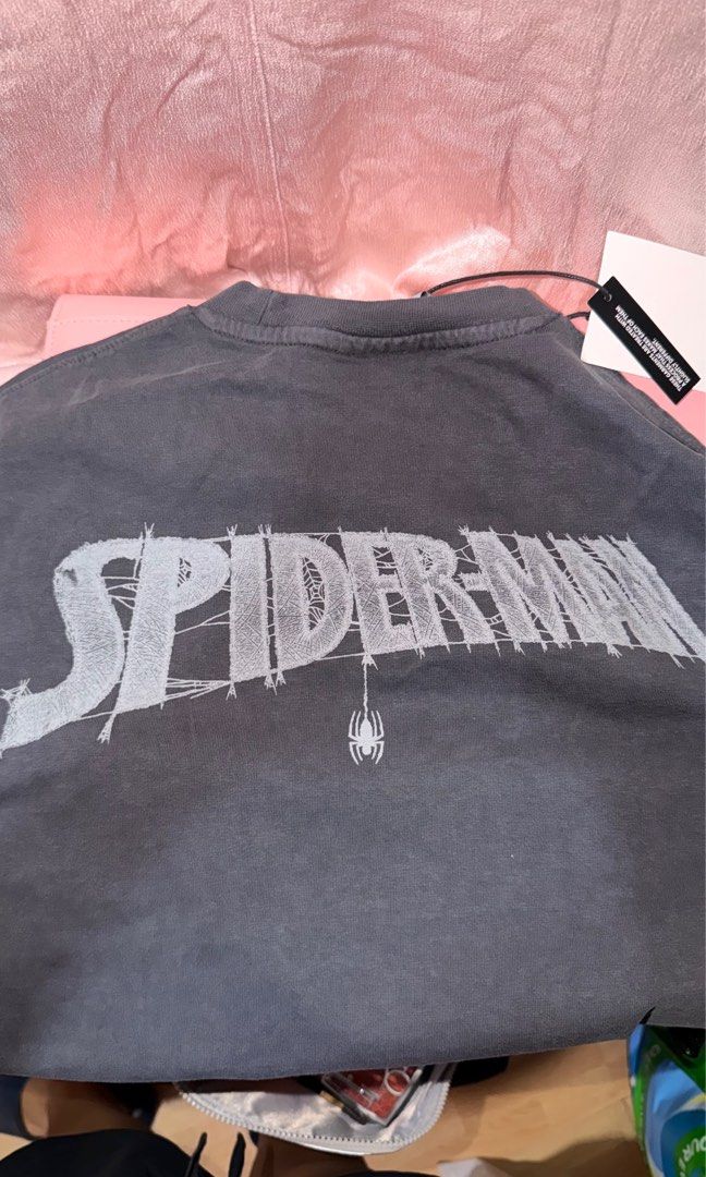 Bershka Marvel Spider-Man T-Shirt (Category: Tshirts & Polo Shirts ) located in Manila. Submitted by beeboodee (Listing ID 1469055740, Image 3). Description: - Brand: Bershka x Marvel - Design: Spider-Man graphic on front, logo lettering on back - Color: Dark grey - Details: Crew neck, short sleeves - Condition: Brand new with tags (BNWT) - Perfect for Marvel fans and casual streetwear style! - RFS: Extra - Last pic for reference when worn (I’m 1