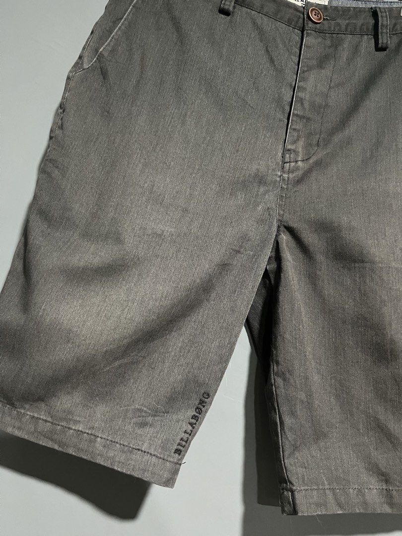 Billabong Grey Casual Shorts Size 31 (Category: Shorts) located in Maasin. Submitted by niconii090 (Listing ID 1468985580, Image 2). Description: - Brand: Billabong - Color: Grey - Size: 31 - Closure: Button closure with zip fly - Pockets: Front pockets, back pockets, and a convenient small side zipper pocket on the leg - Details: Subtle embroidered Billabong branding near the hem -📏 W 30 | L 21.5 | LEG OPENING 11.