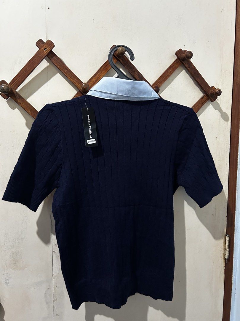 BKK Knitted Top (Category: Blouses) located in Asingan. Submitted by prelovedbykimmy_ (Listing ID 1468979355, Image 2). Description: • two tone (navy blue & light blue collar) • brand new with tag • super stretchy and soft fabric • s-l fit.