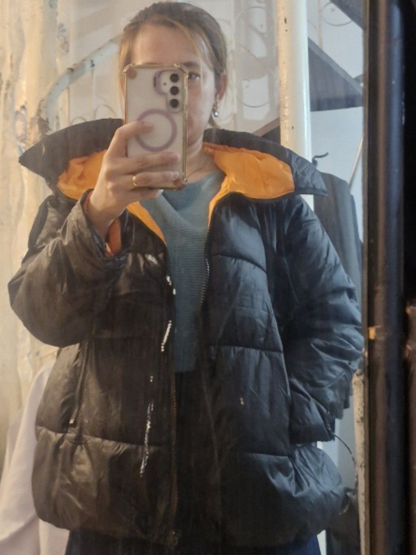 Black and Orange Puffer Jacket Winter Coat (Category: Coats, Jackets and Outerwear) located in Quezon City. Submitted by smrcloset (Listing ID 1469061546, Image 1). Description: - Color: Black with vibrant orange inner lining - Design: All-over puffed quilting for maximum warmth - Protection: High collar blocks out the wind - Closure: Convenient front zip - Style: Great winter essential that pairs easily with casual everyday outfits.