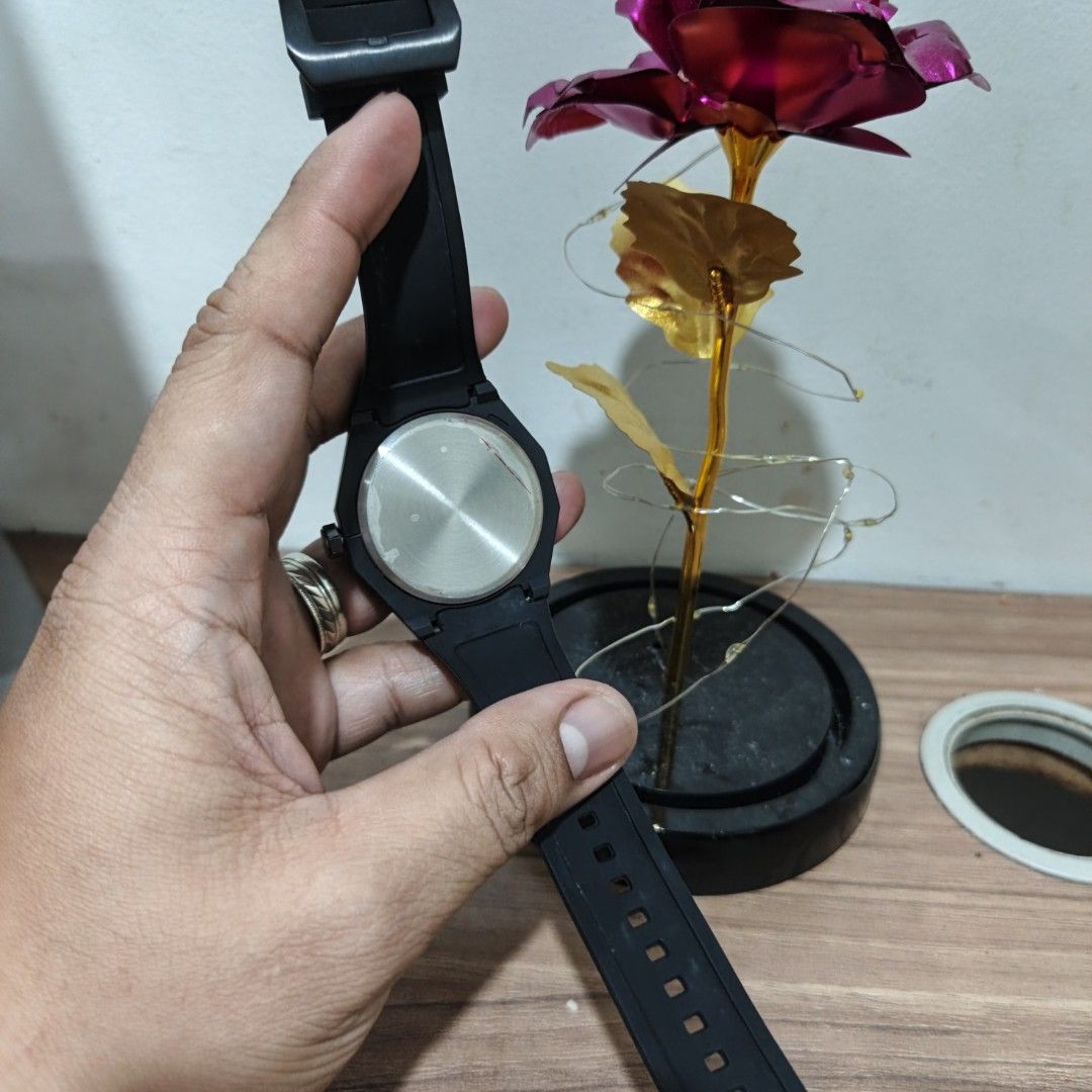 Black and White Graphic Analog Watch (Category: Women's Watches) located in Manila. Submitted by narju1234 (Listing ID 1468999287, Image 3). Description: - Casual everyday analog watch in sleek black - Eye-catching bold white outline graphics on the bezel and strap - Round black dial with minimalist white hour markers and hands - Comfortable rubber strap with a secure standard buckle clasp - Durable stainless steel case back.