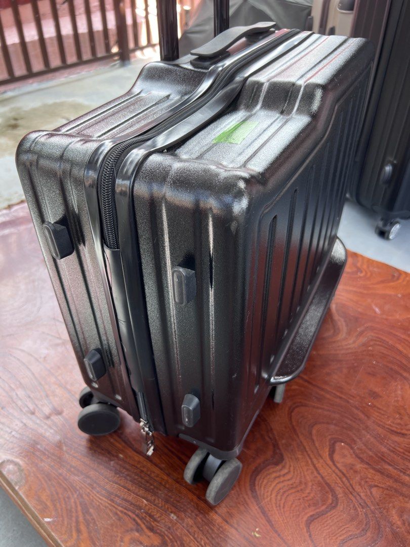Black Carry-On Hard Shell Rolling Luggage Suitcase (Category: Luggage) located in Rizal. Submitted by imallari88 (Listing ID 1469019928, Image 3). Description: - Color: Black hard-shell exterior - Size: Measures 18 inches across (ideal cabin baggage / pakicheck nalang images ) -2-in-1 Design: Combines a travel suitcase with a fun ride-on experience for kids. -Parent-Guided Travel: Features an extendable handle that parents can use to guide or pul