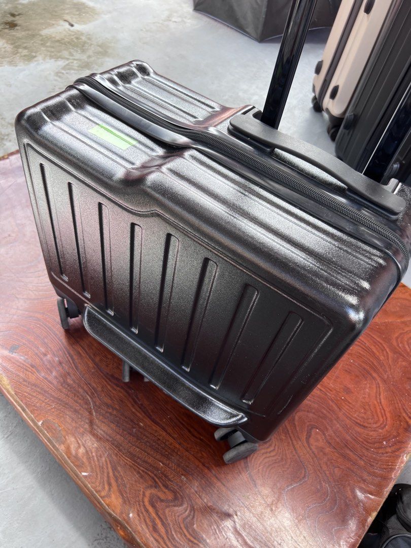 Black Carry-On Hard Shell Rolling Luggage Suitcase (Category: Luggage) located in Rizal. Submitted by imallari88 (Listing ID 1469019928, Image 2). Description: - Color: Black hard-shell exterior - Size: Measures 18 inches across (ideal cabin baggage / pakicheck nalang images ) -2-in-1 Design: Combines a travel suitcase with a fun ride-on experience for kids. -Parent-Guided Travel: Features an extendable handle that parents can use to guide or pul