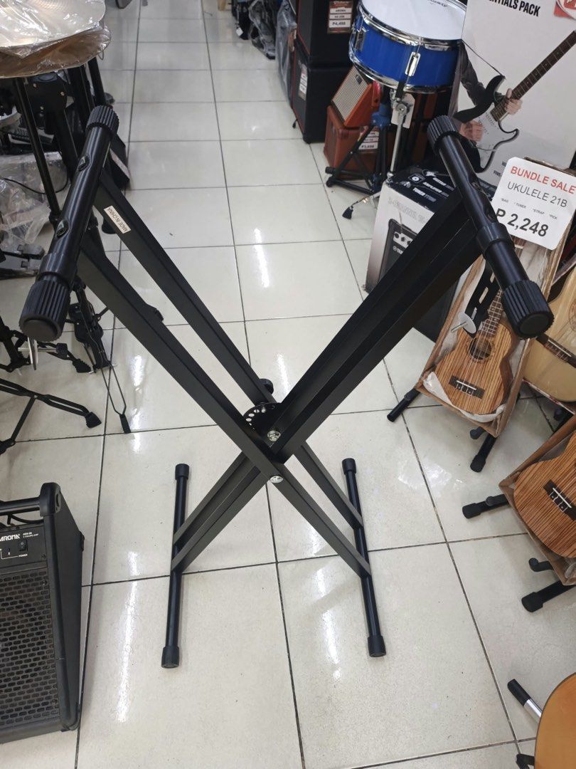 Black Double X Keyboard Stand (Category: Musical Instruments) located in Las Pinas. Submitted by andreadomingo2518 (Listing ID 1469008315, Image 2). Description: - Sturdy black X-style design for reliable support - Center mechanism for easy height adjustment - Non-slip rubber caps on arms and feet to protect your instrument and floors - Universal fit for most digital pianos, synthesizers, and keyboards - Folds completely flat for hassle-free stor