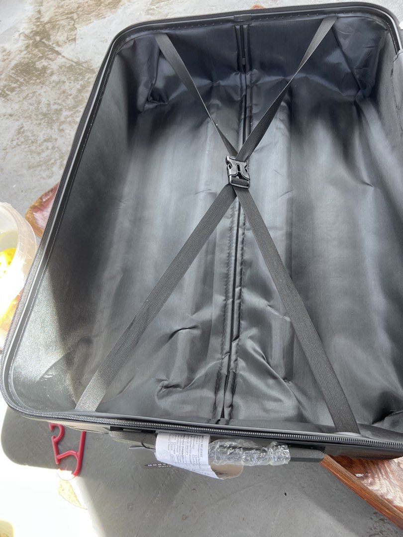 Black Hardside Suitcase Luggage (Category: Luggage) located in Rizal. Submitted by imallari88 (Listing ID 1469018652, Image 1). Description: - Looks Brand new, black hardside suitcase - Protective plastic wrapping still attached to the carry handle - Main compartment equipped with secure packing straps - Mesh zippered divider on the opposite side for better organization - Includes original instruction tag for the combination lock (default 0-0-0 s