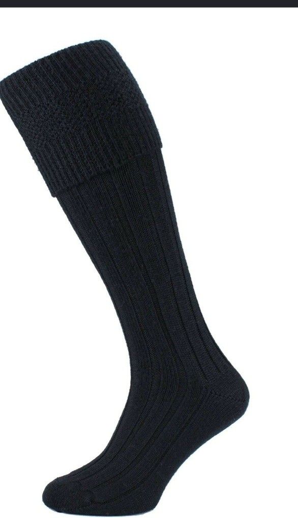 Black Long Knitted Wool Hose Socks (Category: Shoe inserts & accessories) located in Marikina City. Submitted by joyful.finds (Listing ID 1468981962, Image 1). Description: - Color: Black - Length: Knee-high with foldover top cuff design - Texture: Thick, textured wool construction - Pattern: All-over ribbed knit - Versatile use: Ideal for winter wear or traditional Scottish highland dress.