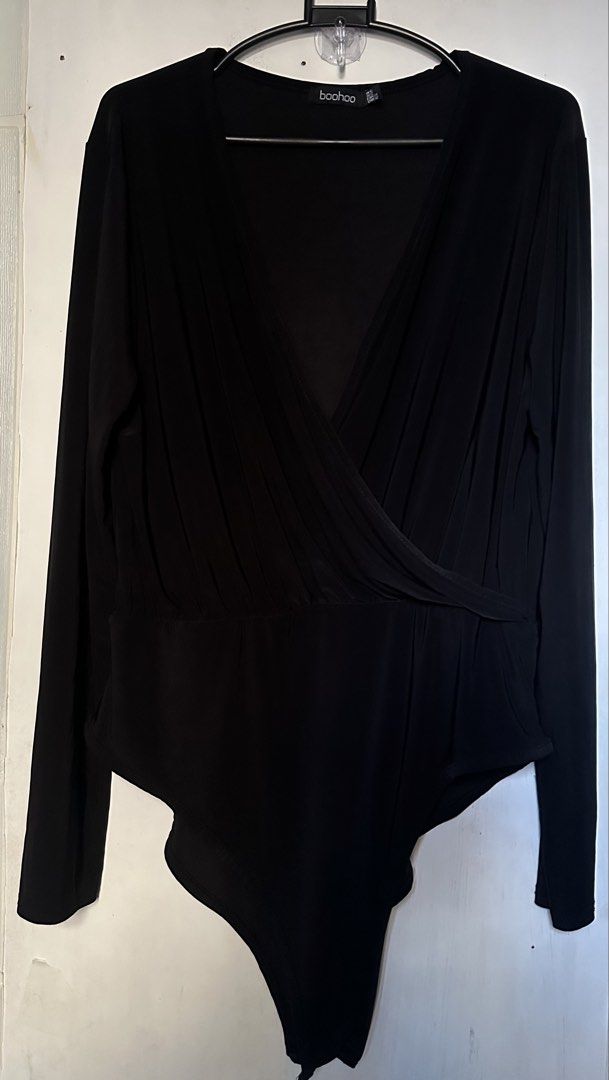 Black longsleeve bodysuit (Category: Others Tops) located in Cavite. Submitted by chicfinds.slay (Listing ID 1469066460, Image 1). Description: ✨best fit for size m-l body frame ✨stretchy comfy ✨easy to pair.