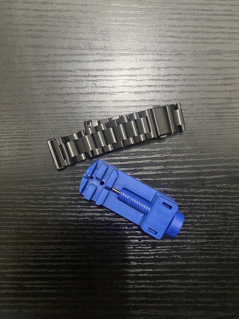 Black Metal Watch Band Link Strap with Tool (Category: Men's Watches) located in Manila. Submitted by avegailofa15029 (Listing ID 1469026739, Image 2). Description: - Material: Sturdy black metal with a modern matte finish - Clasp: Secure and reliable deployment clasp - Compatibility: Huawei watch 5 - Bonus: Includes a blue plastic pin removal tool for easy DIY length adjustment - Condition: Brand new, clean links, ready to use.