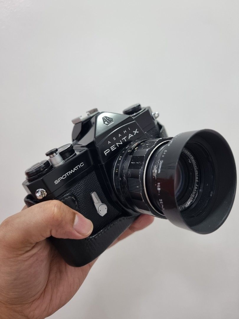 black pentax sp (Category: Cameras) located in San Fernando. Submitted by filmburrrn_ (Listing ID 1469032409, Image 2). Description: black pentax sp with original black color cold shoe and half leather case.. with 50mm 1.4lens free 28mm lens film tested..