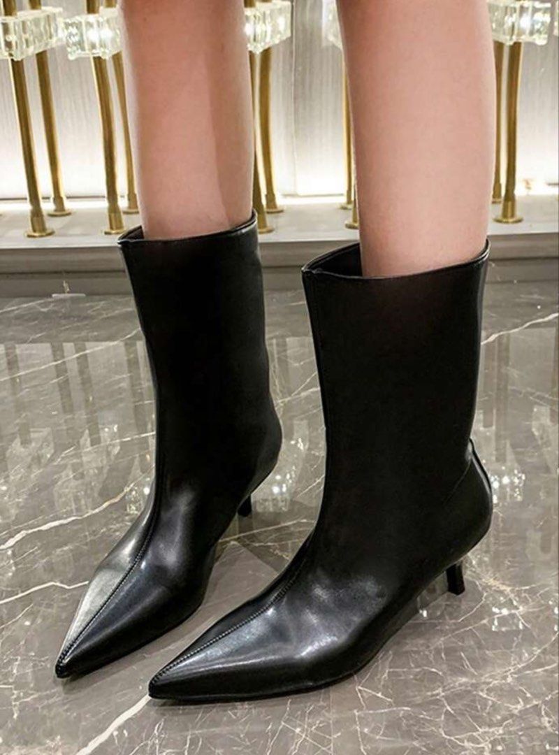 Black Pointed Toe Kitten Heel Boots Mid Calf (Category: Boots) located in Manila. Submitted by arianneliz18 (Listing ID 1468956661, Image 3). Description: - Color & Style: Black mid-calf boots with a clean, minimalist silhouette - Toe & Heel: Elegant pointed toe with a comfortable kitten heel for all-day wear - Finish: Smooth matte texture - Closure: Convenient pull-on style with no zippers - Versatility: Easy to style with dresses, skirts, or tr