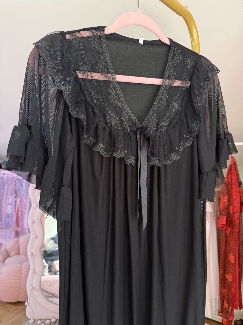Black Princess Mesh Dress (Category: Dresses) located in Caloocan City. Submitted by fashionshop248 (Listing ID 1468952314, Image 2). Description: - Style: Black princess dress - Design: Short sleeves, ruffled lace collar, tie ribbon at the neckline, and tiered hemline - Material: Lightweight mesh - Size: Fits S to XL.