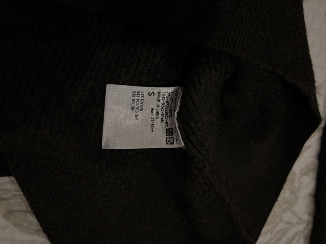Black Ribbed Sweater (Category: Coats, Jackets and Outerwear) located in Muntinlupa City. Submitted by wisemountain-8175 (Listing ID 1469043824, Image 2). Description: - Material: Rayon, Polyester, Nylon blend - Details: Ribbed knit texture, front slit neckline, long sleeves, straight hem - Great layering piece - RFS: too small.
