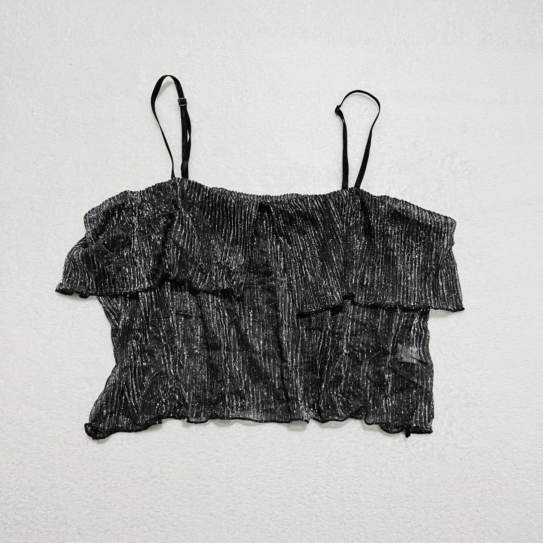 Black Silver Metallic Shimmer Ruffle Cami Tank Top (Category: Sleeveless) located in Binan City. Submitted by veniceao (Listing ID 1469048820, Image 1). Description: PLEASE READ ❤️ Loc: Manila/Laguna (open for checkout for cheaper sf—starts at ₱20) For sure buyer: 1. Make an offer. 2. Send your details for confirmation 3. Pay until 3pm the next day I confirm the order. Details: - Fits size xsmall-med - Color/Finish: Black and silver with a stunni