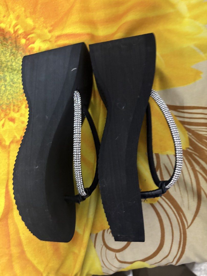 Black Wedge Flip Flops with Rhinestone Straps (Category: Wedges) located in Manila. Submitted by nykji96 (Listing ID 1468979694, Image 2). Description: - Style: Thong-style platform wedge sandals - Color: Black with sparkling rhinestone strap details - Heel: Chunky wedge for comfortable height - Sole: Textured zig-zag rubber outsole for great traction - Perfect for: Casual summer outfits and beach days.