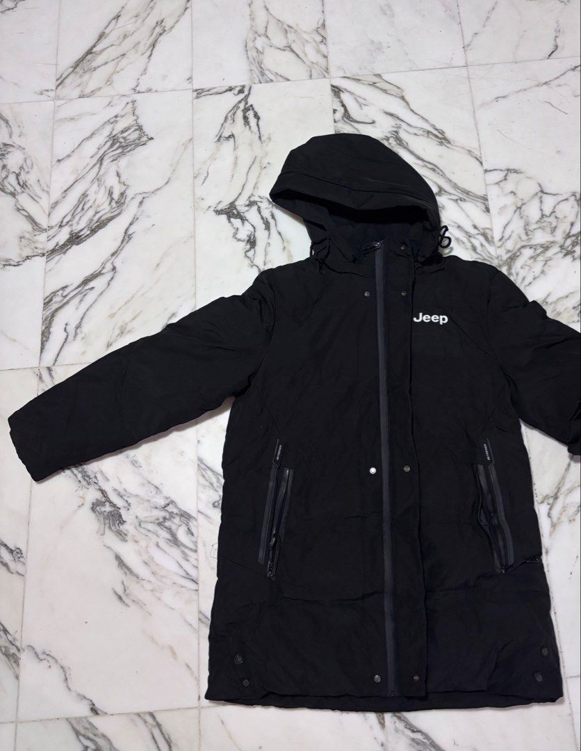 Black Winter Jacket (Category: Coats, Jackets and Outerwear) located in Singapore. Submitted by rachie9 (Listing ID 1469109821, Image 4). Description: Size: XXL (look at 5th pic for measurements) Length reaches mid thigh (for men at 164cm) Hoodie is detachable Meet-ups at tanah merah / bedok mrt or near my area if you drive/ride. Brand/Model: Jeep Spirit Black Down Jacket - Filling: 90% premium white goose down with high loft and great compressio