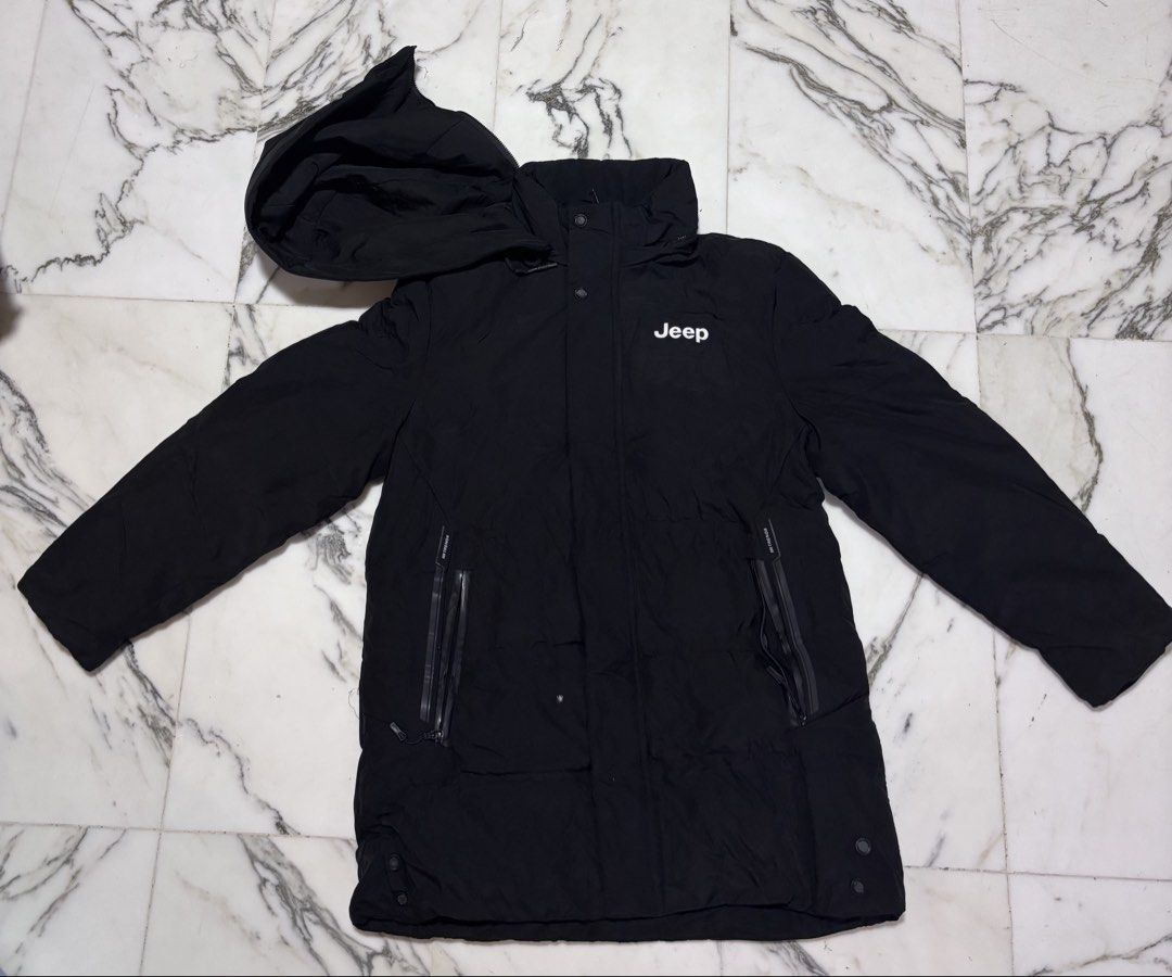 Black Winter Jacket (Category: Coats, Jackets and Outerwear) located in Singapore. Submitted by rachie9 (Listing ID 1469109821, Image 2). Description: Size: XXL (look at 5th pic for measurements) Length reaches mid thigh (for men at 164cm) Hoodie is detachable Meet-ups at tanah merah / bedok mrt or near my area if you drive/ride. Brand/Model: Jeep Spirit Black Down Jacket - Filling: 90% premium white goose down with high loft and great compressio
