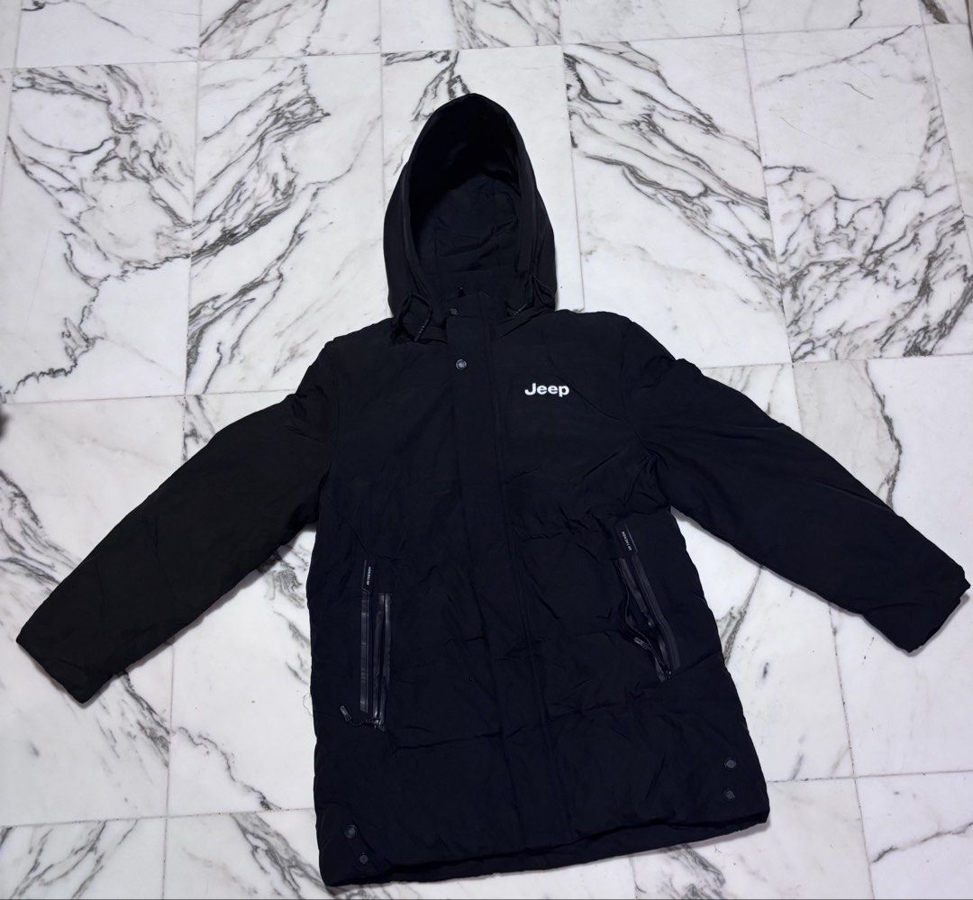 Black Winter Jacket (Category: Coats, Jackets and Outerwear) located in Singapore. Submitted by rachie9 (Listing ID 1469109821, Image 1). Description: Size: XXL (look at 5th pic for measurements) Length reaches mid thigh (for men at 164cm) Hoodie is detachable Meet-ups at tanah merah / bedok mrt or near my area if you drive/ride. Brand/Model: Jeep Spirit Black Down Jacket - Filling: 90% premium white goose down with high loft and great compressio