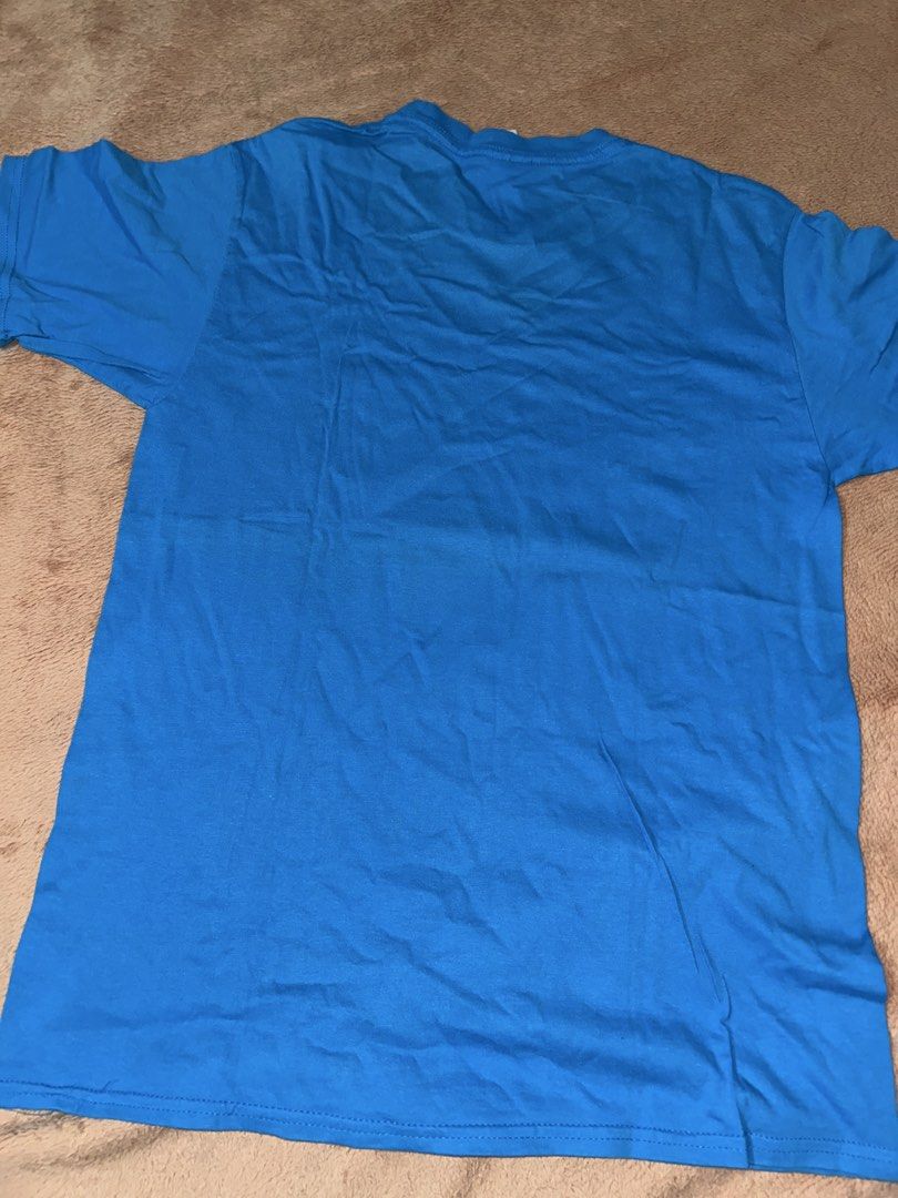 Blue Dream Work T-Shirt Size M (Category: Tshirts & Polo Shirts ) located in Manila. Submitted by prelovedbyanavi (Listing ID 1468960760, Image 2). Description: - Color: Bright blue - Design: Large white 'dream work' graphic print - Fit: Standard fit / Regular style - Size: Medium - Material: Comfortable regular cotton - Neckline: Classic crew neck.