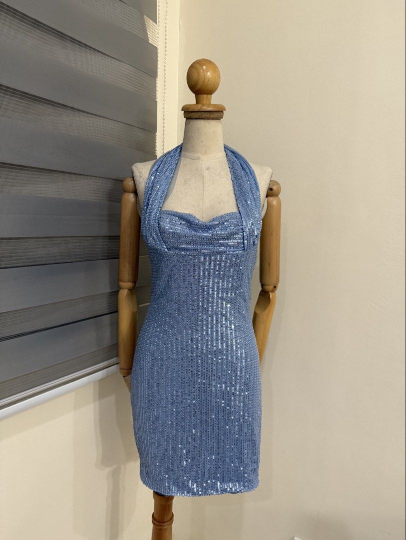 Blue Sequin Halter Neck Bodycon Mini Dress (Category: Dresses) located in Antipolo. Submitted by jackiestash2 (Listing ID 1469157827, Image 1). Description: - Color: Sparkling baby blue - Design: Halter neck with back ties and draped front neckline - Fit: Bodycon, knee-length - Details: Fully covered in sequins from top to bottom Antipolo Gcash&Bdo Lalamove/J&T.