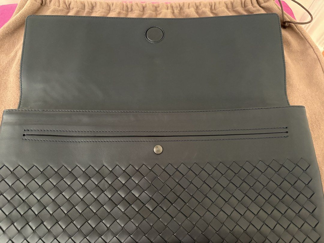 Bottega Veneta Clutch Bag (Category: Luxury Bags & Wallets) located in Muntinlupa City. Submitted by ironman0907 (Listing ID 1469054261, Image 2). Description: ▣ Brand: Bottega Veneta ▣ Model: Clutch Bag 598202 ▣ Condition: Brand New ▣ Colors: Dark Navy ▣ Size: 35 cm (W) × 24 cm (H) ▣ Made in: Italy Product Features: * Signature Intrecciato Design: Iconic woven leather pattern that reflects Bottega Veneta’s understated luxury. * Premium Leather C