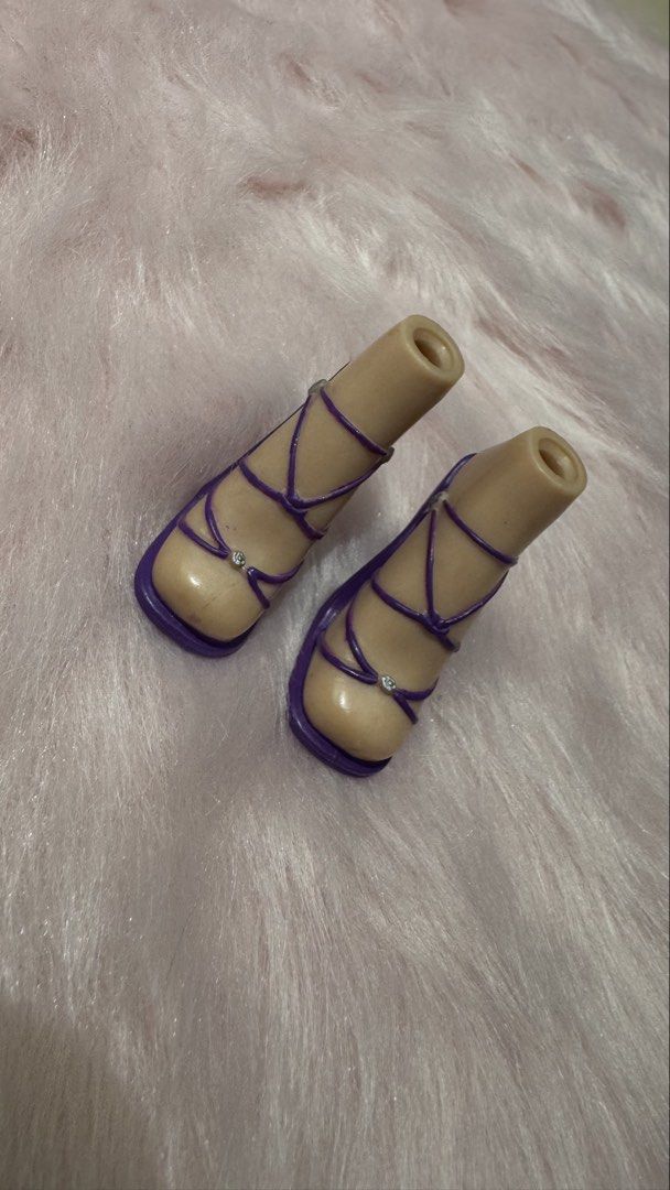 Bratz cloe winter ball shoes (Category: Heels) located in Mandaluyong City. Submitted by maelovestoshop (Listing ID 1469097392, Image 1). Description: Purple strappy high heels with doll feet Clean and ready for use No flaws.