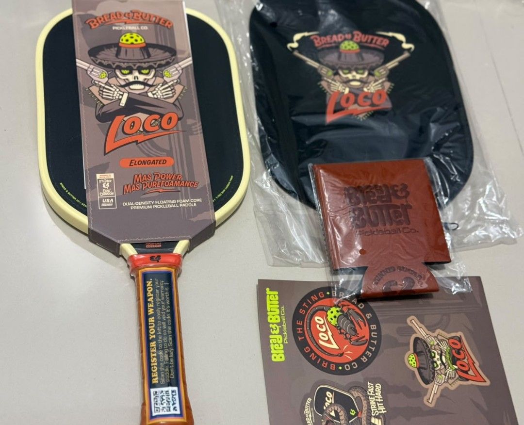 Bread & Butter Loco Elongated Pickleball Paddle Bundle (Category: Racket and Ball Sports) located in Manila. Submitted by grumpy.d (Listing ID 1469099562, Image 1). Description: - Brand: Bread & Butter Loco (Elongated Pickleball Paddle) - Condition: Unused, tag still on handle - Core: Dual-density floating foam core for great playability - Inclusions: Matching paddle cover, leather can cooler, and original stickers - Status: Ready to play straigh