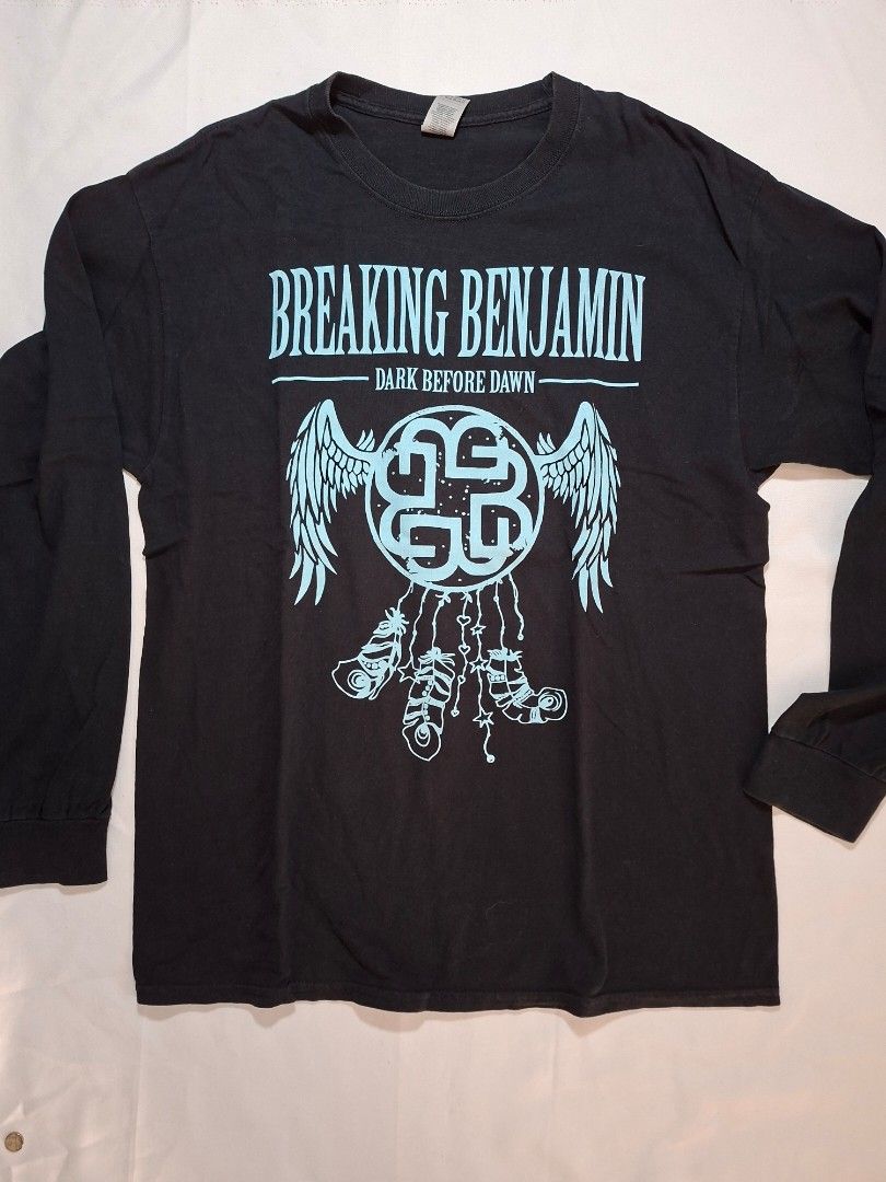 Breaking Benjamin Dark Before Dawn Long Sleeve Shirt (Category: Tshirts & Polo Shirts ) located in Baguio. Submitted by restyrille77846 (Listing ID 1469019218, Image 1). Description: - Band/Album: Breaking Benjamin - Dark Before Dawn - Color: Black - Size: Large (Gildan tag) - Material: 100% Cotton - Design: Front graphic print featuring wings and a dreamcatcher - Condition: Great piece for fans and collectors.