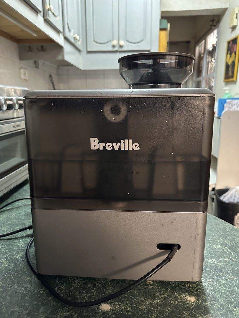 Breville Barista Express Espresso Machine with Grinder (Category: Coffee Machines & Makers) located in Manila. Submitted by olxph_561736521 (Listing ID 1468949038, Image 3). Description: - Model: Breville espresso machine in brushed stainless steel finish - Grinder: Built-in conical burr grinder with side adjustable grind size dial - Controls: Centered pressure gauge with buttons for single/double shots, program settings, and manual control - Inc