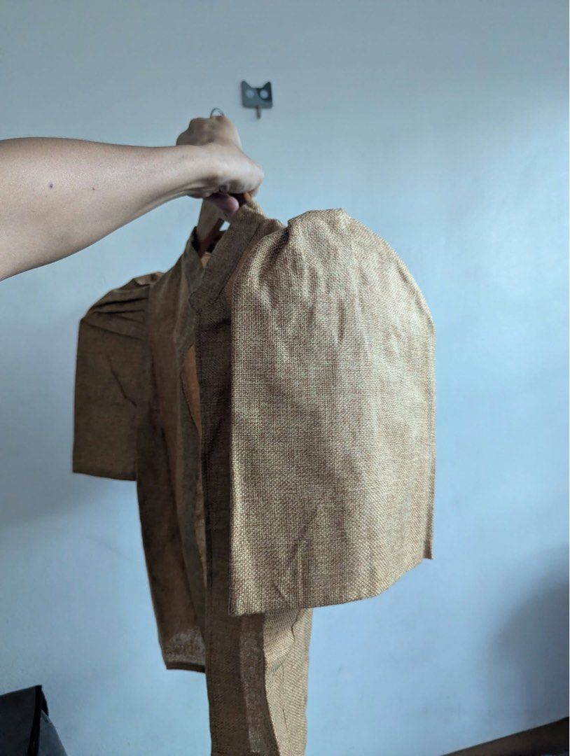 Brown Burlap Style Puff Sleeve Open Front Blouse (Category: Blouses) located in Quezon City. Submitted by thegoodkarmaph (Listing ID 1469009652, Image 2). Description: - Color: Brown - Material: Textured rustic burlap - Style: Open-front top with mandarin collar and boxy cut - Sleeves: Short sleeves with structured shoulder pleats - Condition: Excellent.