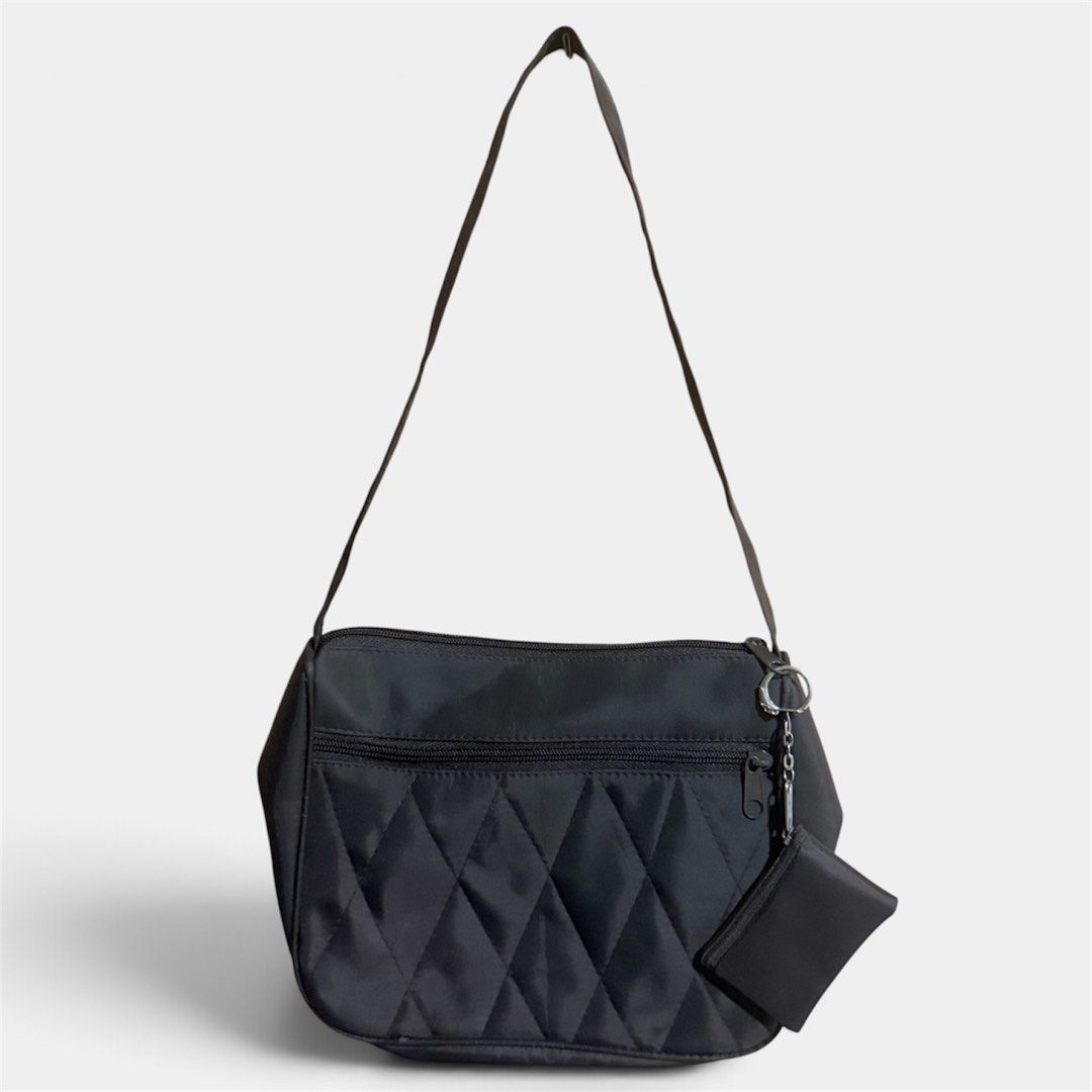 Brown Quilted Nylon Shoulder Bag with Coin Pouch (Category: Shoulder Bags) located in Manila. Submitted by only_alyssacloset (Listing ID 1469011133, Image 1). Description: - Stylish brown quilted nylon shoulder bag for everyday use. - Secure zip top closure with a convenient front zip pocket. .