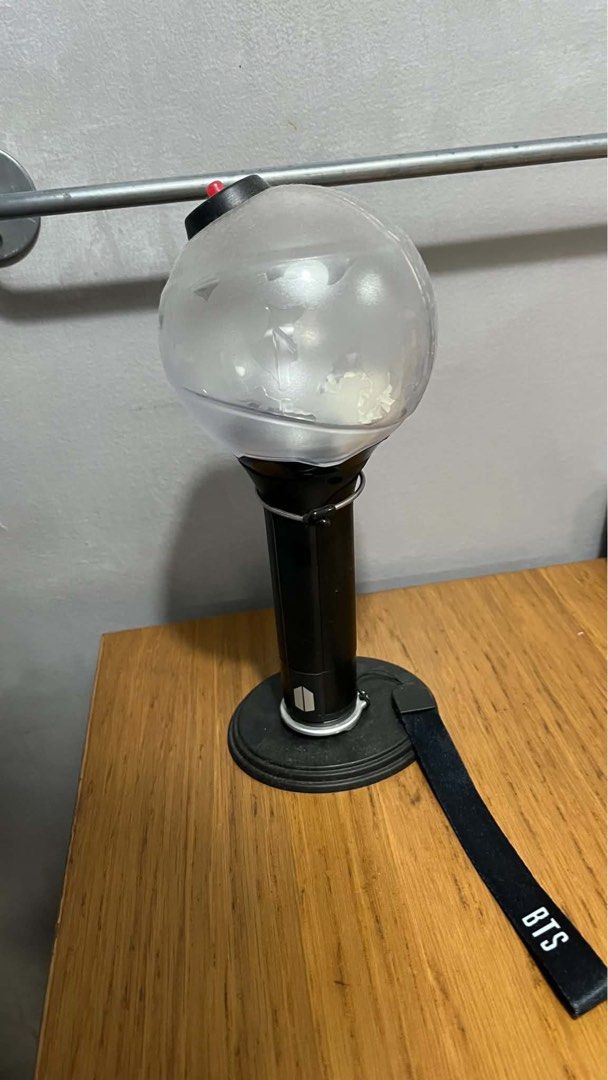 BTS Official Lightstick Army Bomb Version 3 With Stand No Box (Category: K-Wave Merchandise) located in Quezon City. Submitted by jslvr_ (Listing ID 1469136944, Image 1). Description: 📌 Condition and Details - IS OFFICIAL - Army Bomb: well-kept, stored in sleeves. - Like New Condition - Please confirm availability before payment. 📍Shipping - SDD: Lalamove - Shipping fee c/o buyer - Can meet up around UP Town Center Katipunan ‼️ Notes - Can send