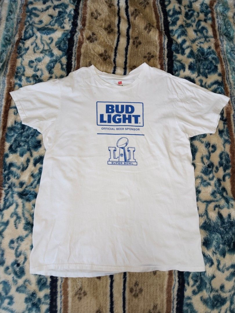 Bud Light x Super Bowl LI Official Tee — Size L (Category: Tshirts & Polo Shirts ) located in Mabalacat. Submitted by al_amin_thrift (Listing ID 1469019510, Image 1). Description: Bud Light x Super Bowl LI Official Tee — Size L ✔️ Authentic Hanes quality — soft 100% cotton ✔️ Collectible Super Bowl LI (51) Bud Light design ✔️ Classic fit — Size Large ✔️ Pre-loved in good condition — clean & intact 💰 349 — FREE SHIPPING if purchased at fixed pric