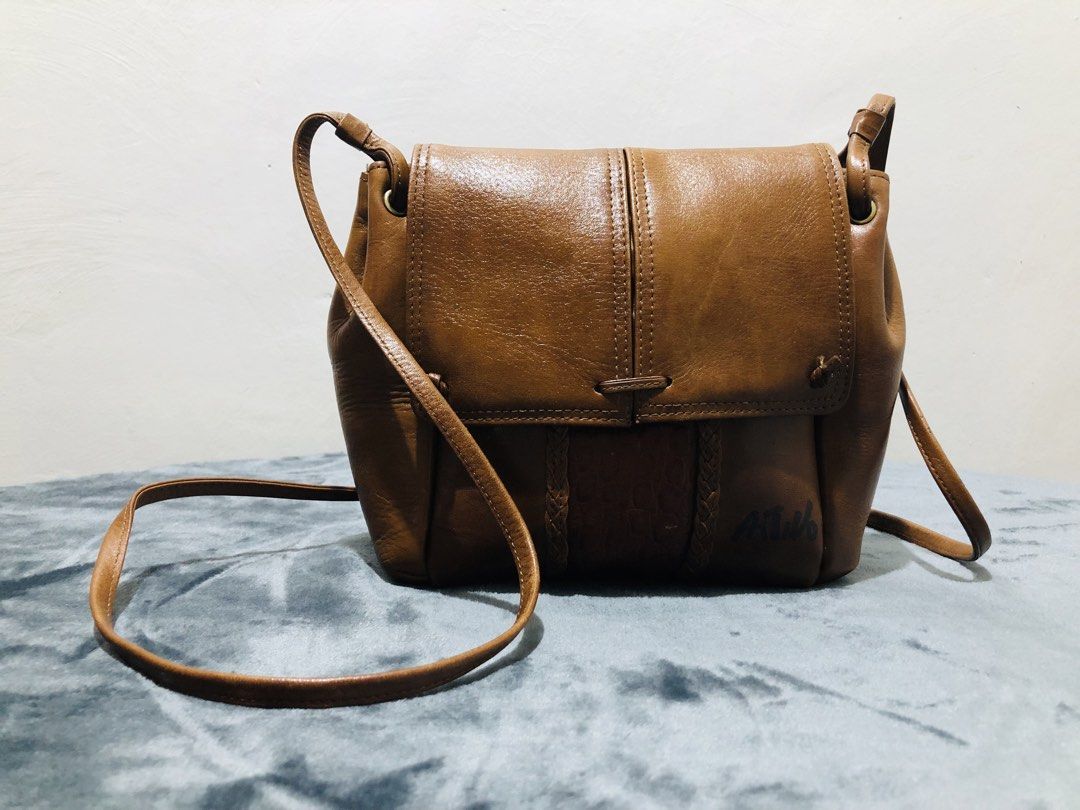 (BUNDLE) GENUINE LEATHER JAPAN BAGS (Category: Cross-body Bags) located in Imus. Submitted by dhouseoftotes (Listing ID 1468984701, Image 3). Description: 📐 MEASUREMENTS‼️ BROWN SLING H - 8 inches W - 10 inches D - 3 inches GREEN SLING H - 6 inches W - 8 inches D - 3 inches (almost) DISCLAIMER!! I am not affiliated, associated, authorised, endorsed by, or in any way officially connected with any of the brands, companies, or trademarks mentioned 